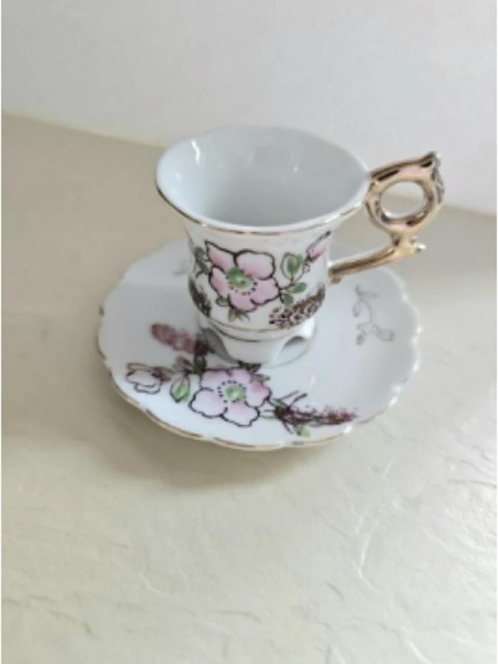 Porcelain Teacup and Saucer with Pink Floral Pattern and Gold Trim